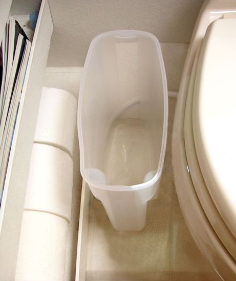 clever rv bathroom trash can idea using a cereal container