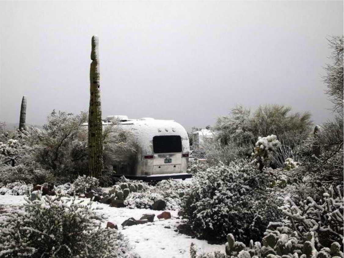 rv in a snowy mountain area