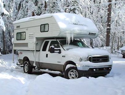 truck camper in snow