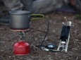 PowerPot charging an iPhone in the field