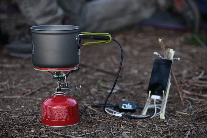 PowerPot charging an iPhone in the field