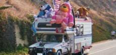 Front of a Toyota RV with a bunch of stuffed animals