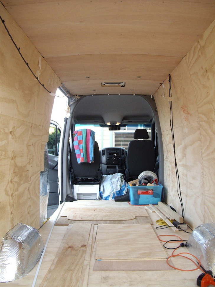 Insulation and paneling installed in a van camper