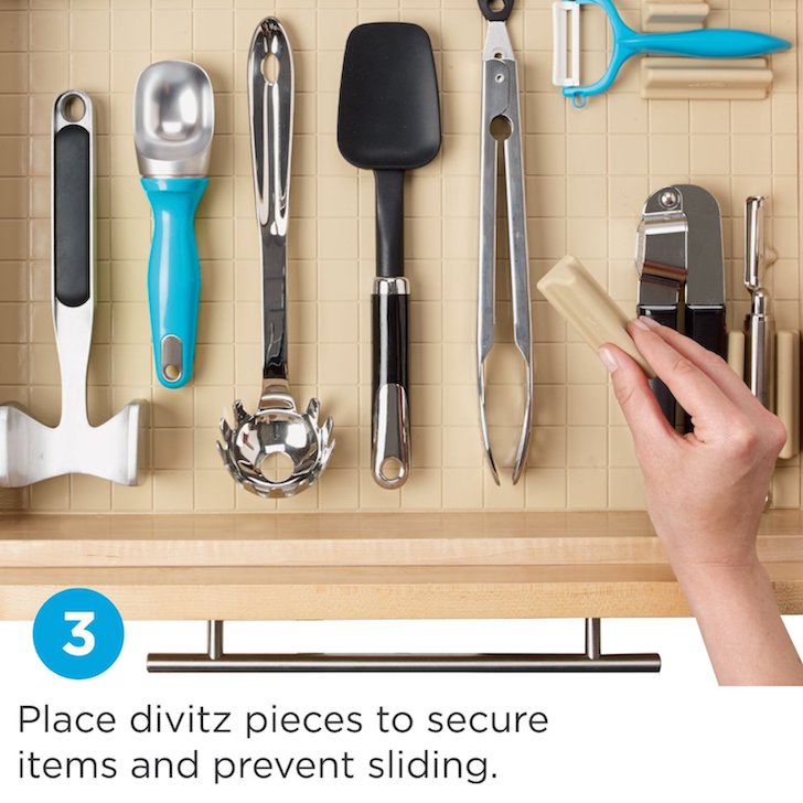 Use divider pieces to secure utensils