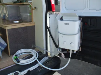 Van shower with tankless water heater