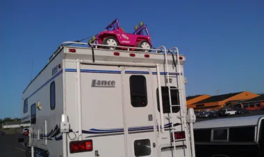 Toy jeep on truck camper
