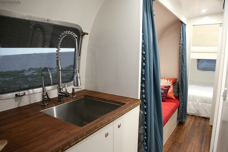 Kitchen and reading nook area in an Airstream