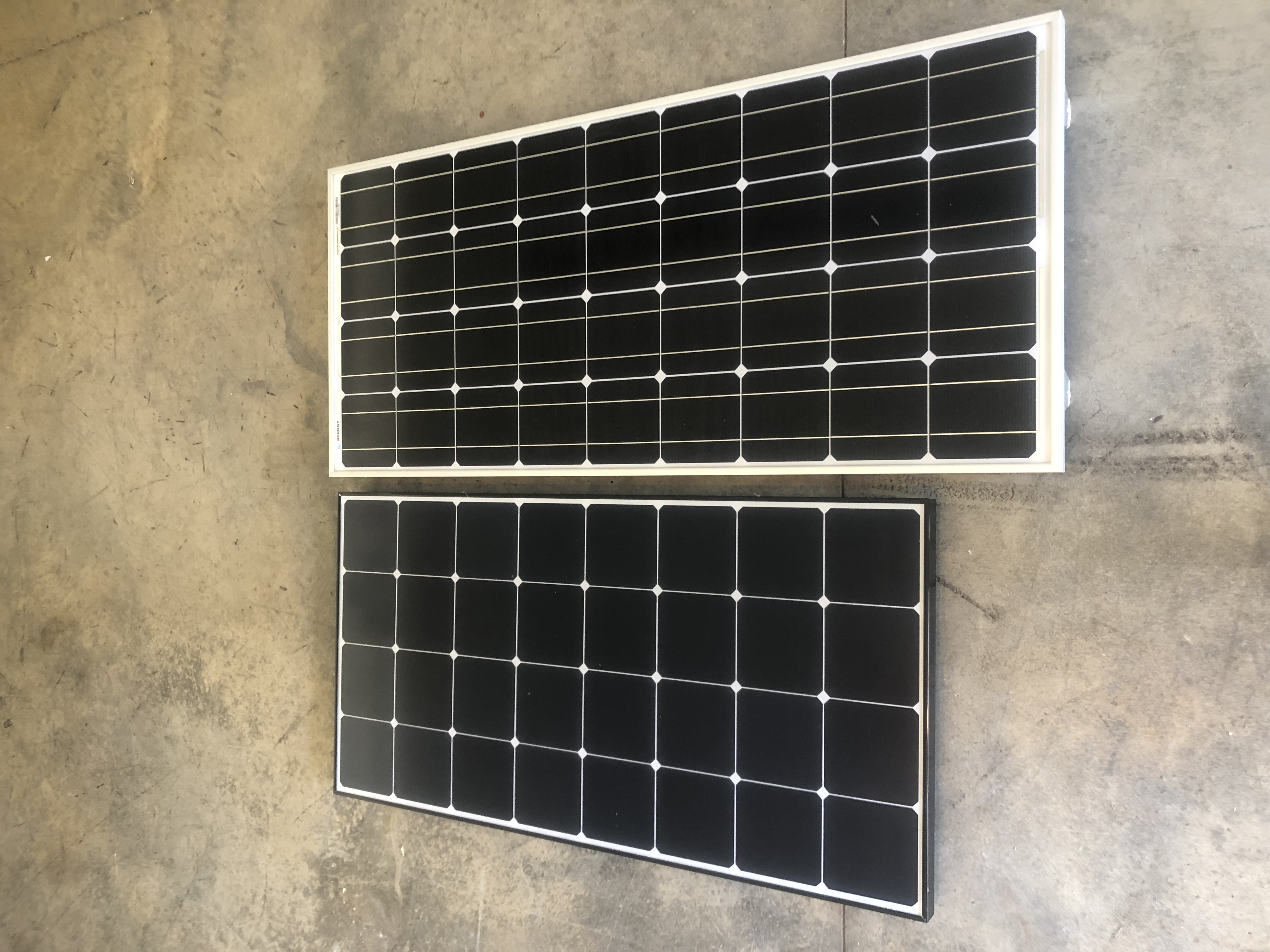 Both of these panels are Made by Renogy solar and are rated 100 watts, but they are very different in size. 