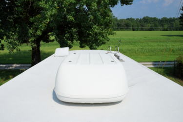 RV roof with covered AC unit