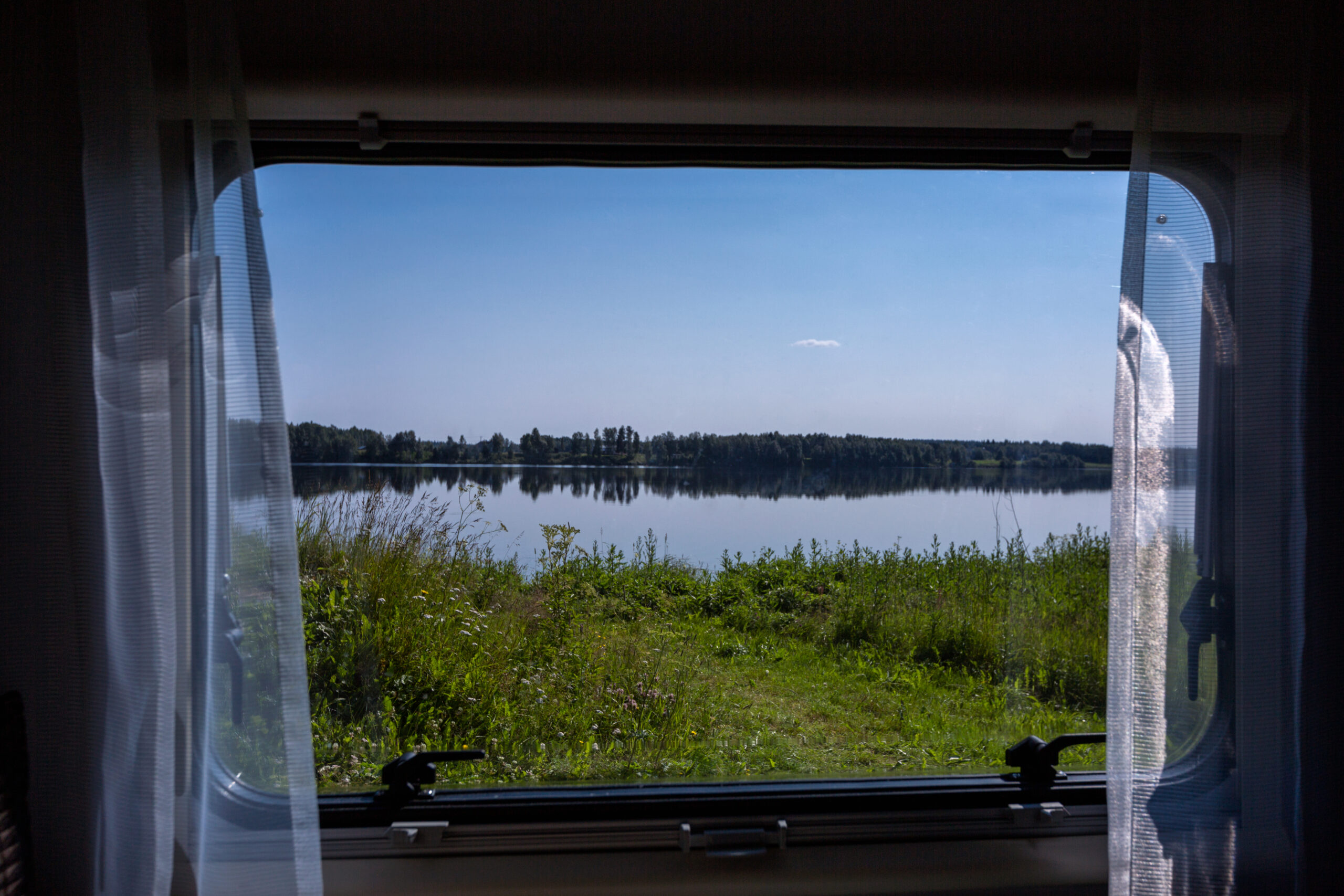 RV window replacement - looking out at a lake view