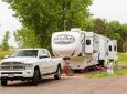 fifth wheel and truck at campsite