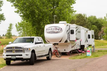 fifth wheel and truck at campsite