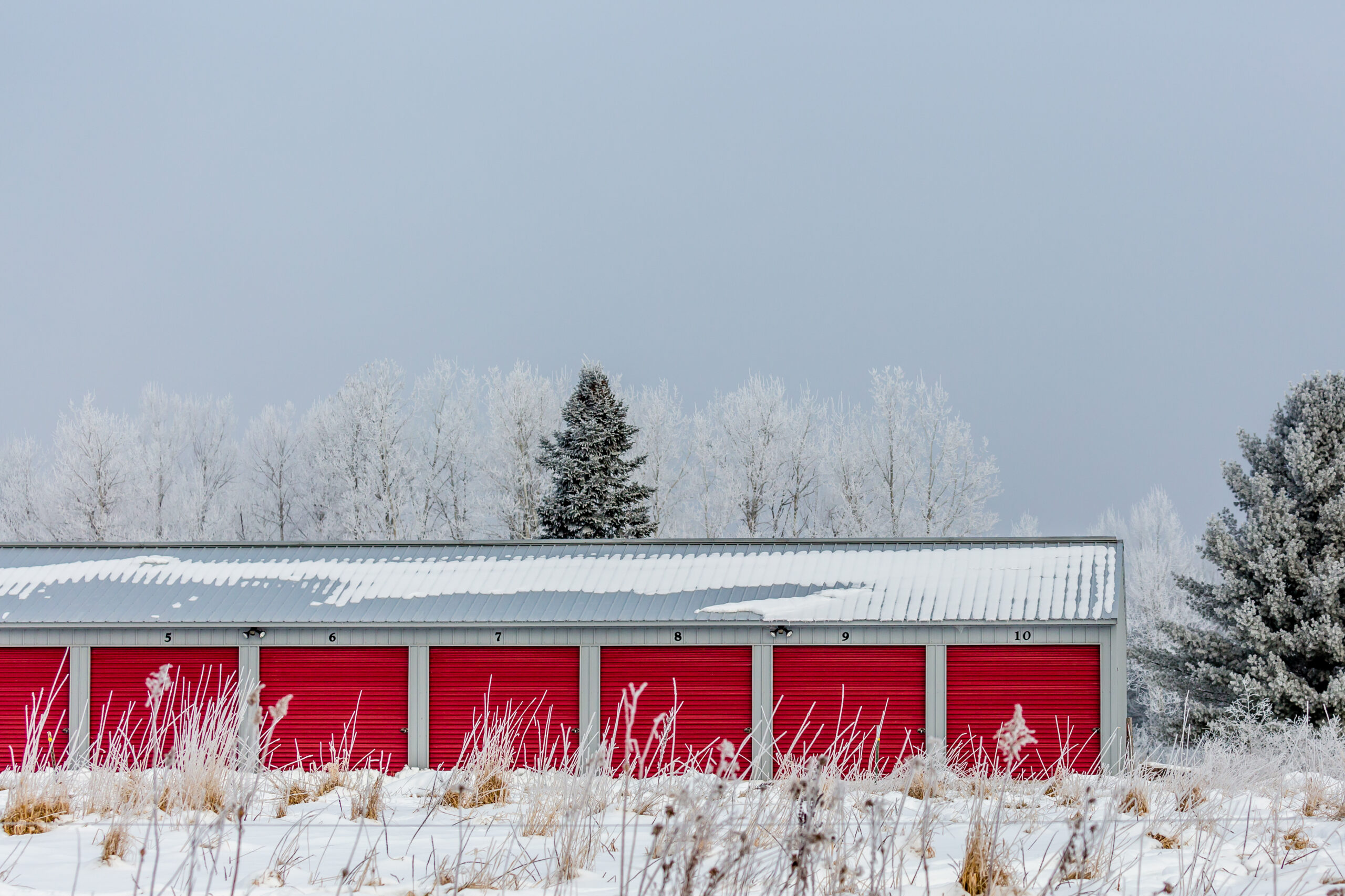 Row of storage garages in winter. Will you sell your rv this winter or store it in one of these?
