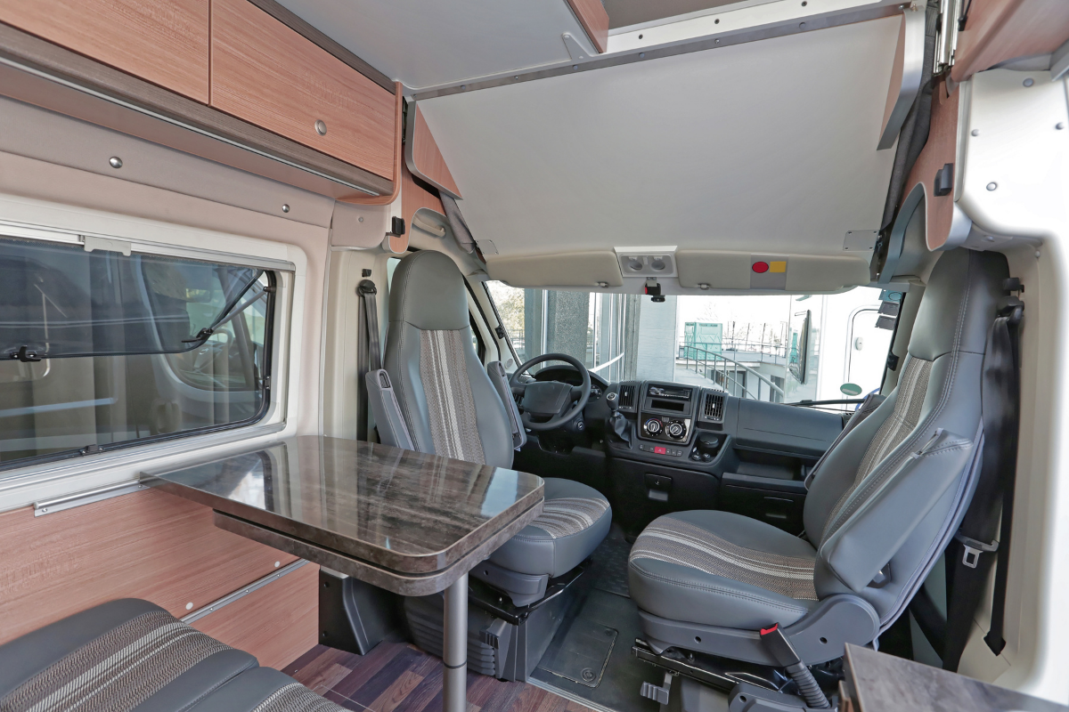 Back of a motorhome looking into the driving area with swivel seats - RV captain's chairs 