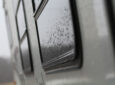 close up of window on a rainy day before applying the best RV window sealant