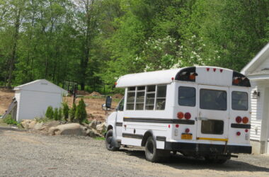 white mid-bus school bus featuring lots of bus conversion ideas
