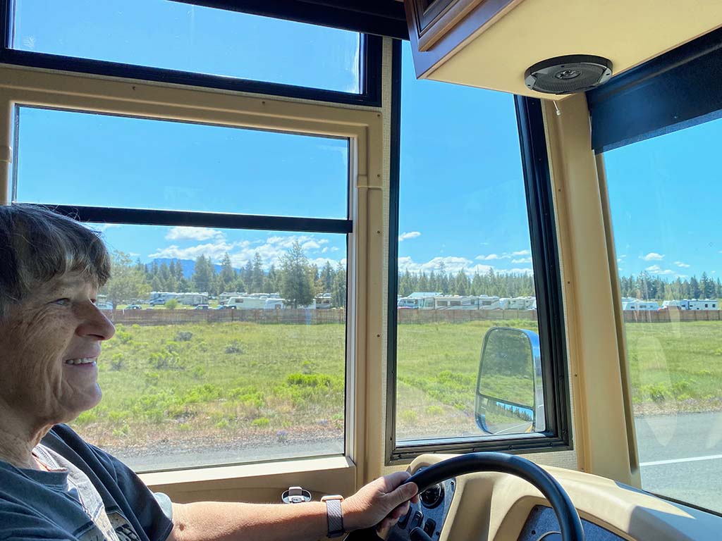 A person using the 10+ RV driving tips in a Class A RV