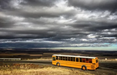skoolie bus conversion in front of stormy clouds