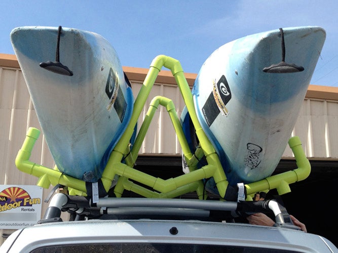PVC piping kayak rack with two kayaks on roof of vehicle - how to build a kayak rack for an RV