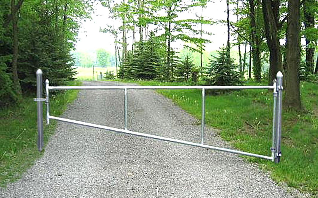 Tubular barrier gate at driveway entrance
