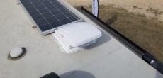lap sealant applied and fan installed on roof of RV - feature iamge for How To Replace An RV Roof Vent Fan