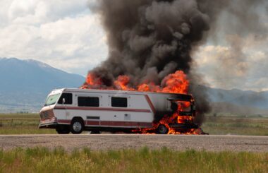 An rv catches fire on the side of the road