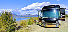 motorhome with slides out - feature image for What To Do When Your RV Slide Outs Move While Driving