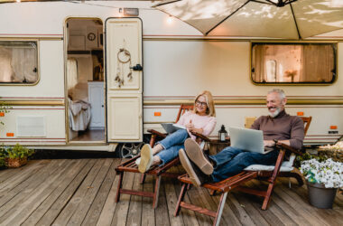 RV deck ideas with two RVers in front of camper