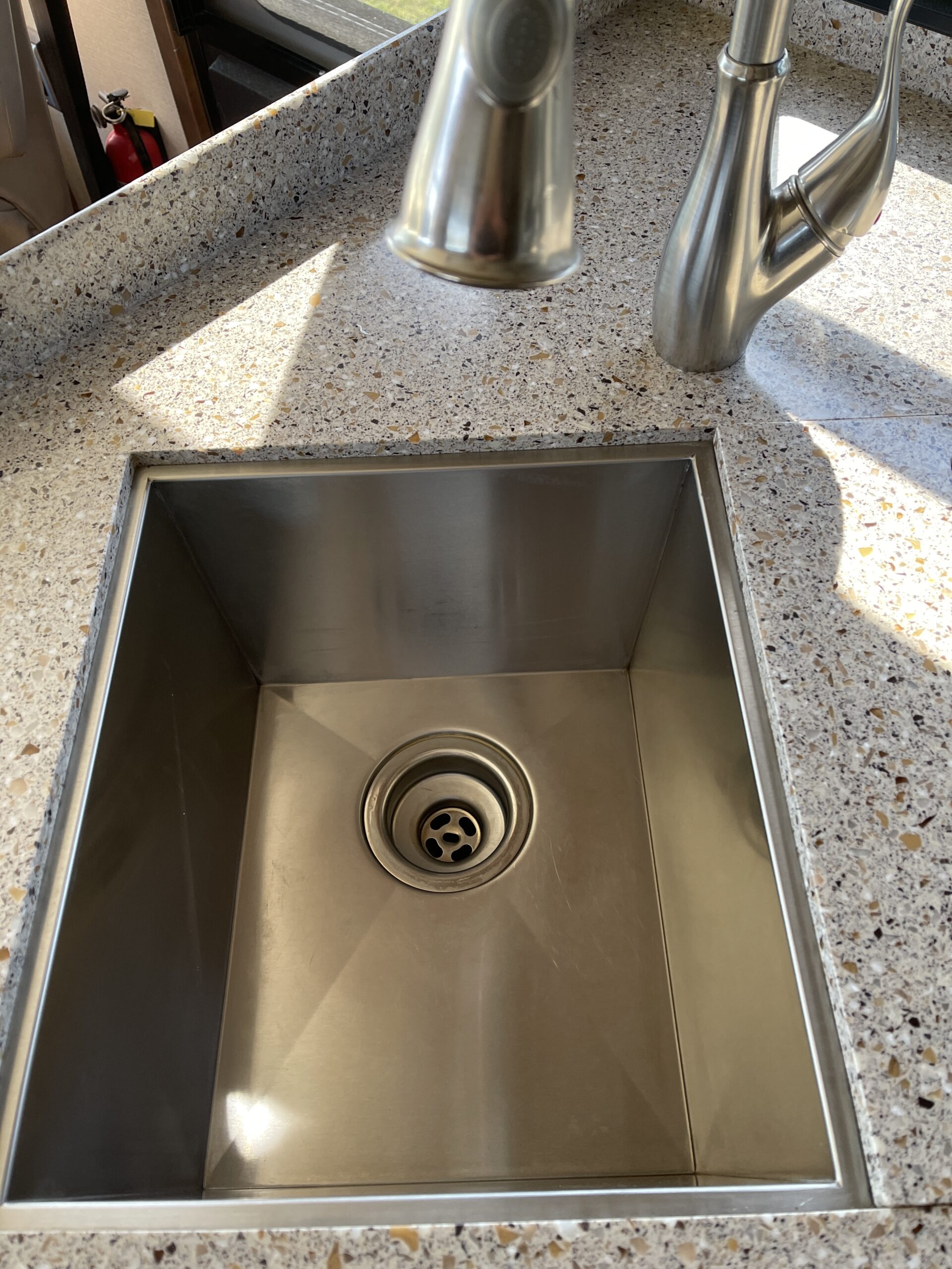 stainless steel sinks require extra effort to keep them shiny