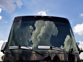 RV windshield on a Class A motorhome - feature image for RV windshield repair