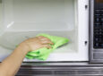 hand cleaning microwave - feature image for microwave cleaning trick