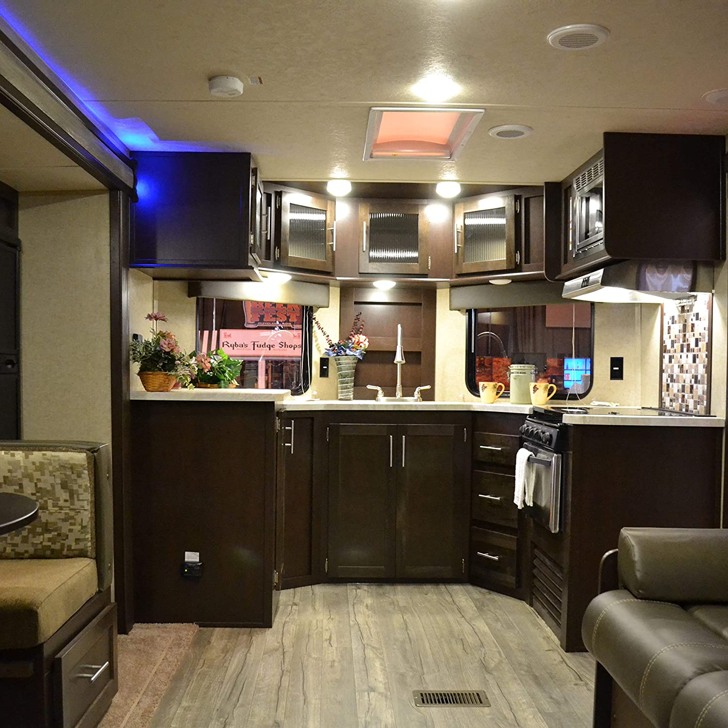 Modern RV interior with bright kitchen lights - upgrading rv interior lights to LED 