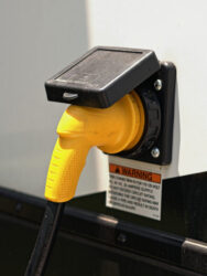 RV plugged in - feature image for RV electrical safety tips