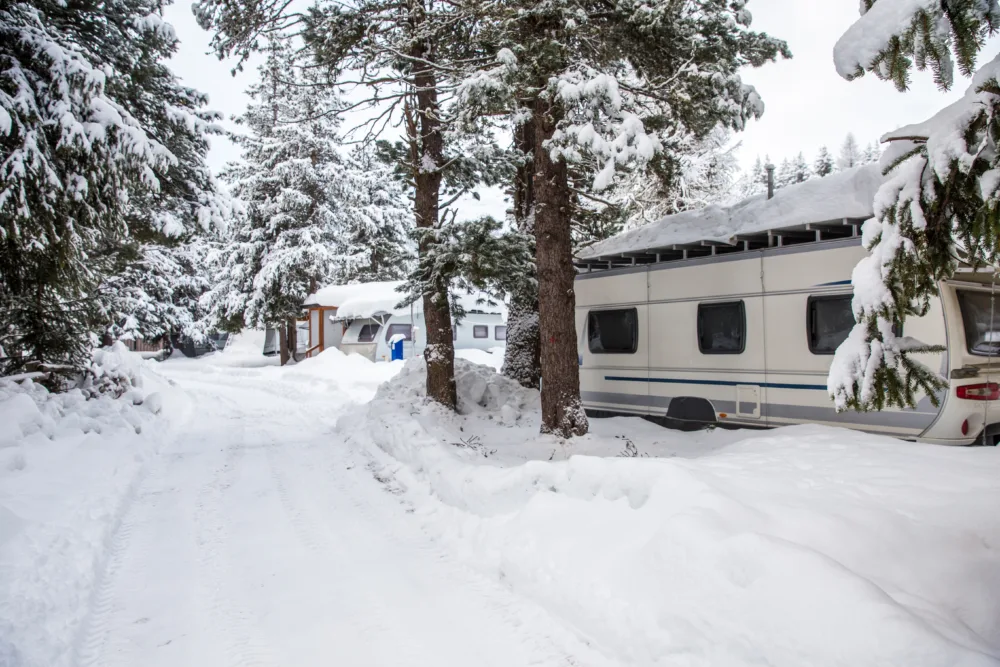 snowy RV park - feature image for RV roof damage