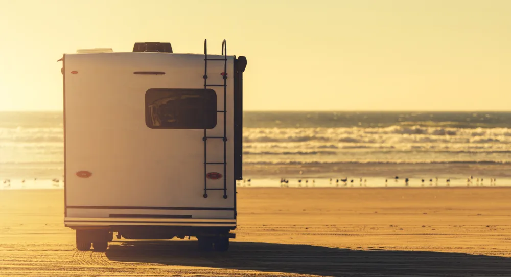 RV on beach - image for ways to conserve power