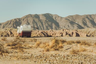 RV boon docking in the desert - feature image for conserve power