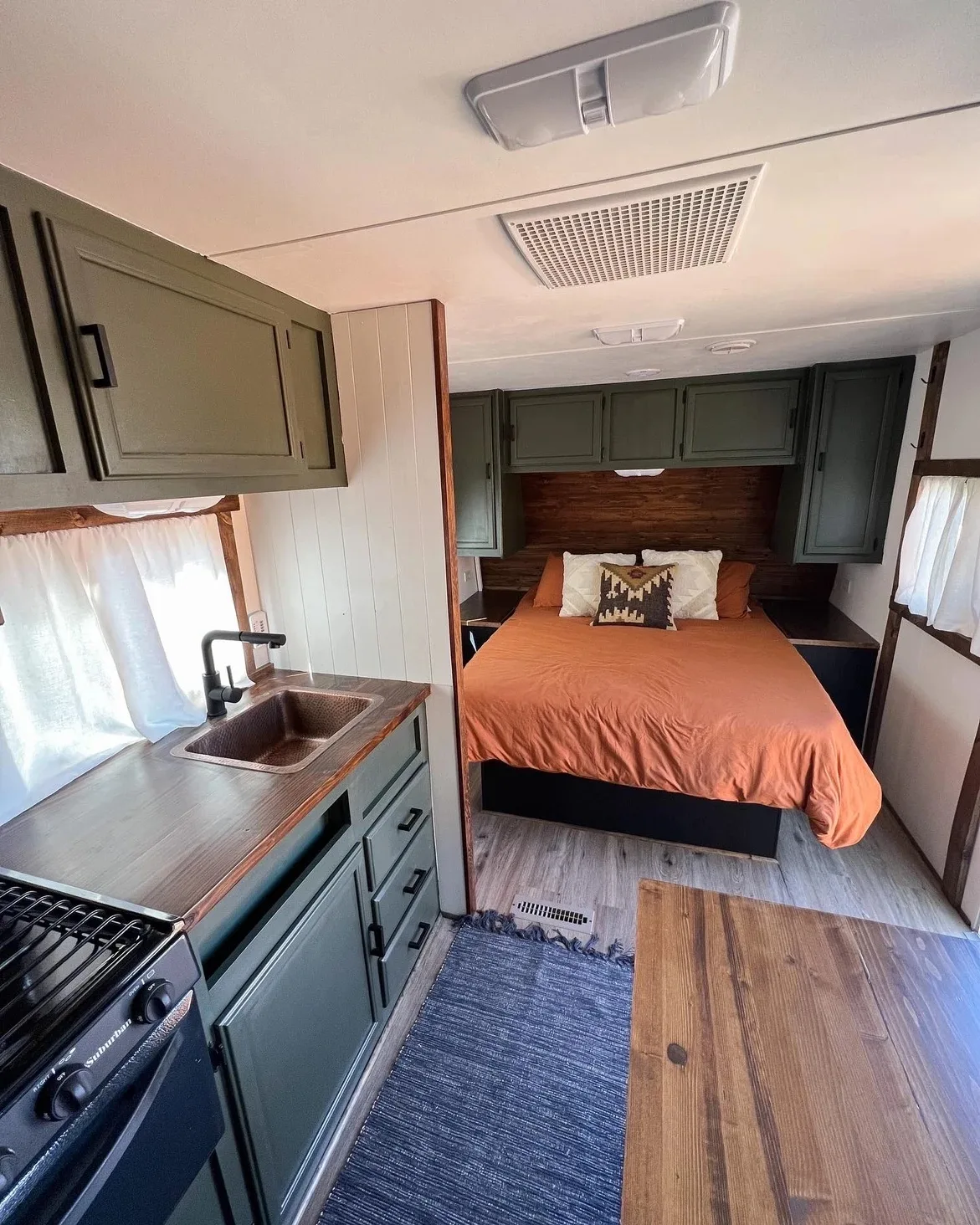 bedroom in renovated camper