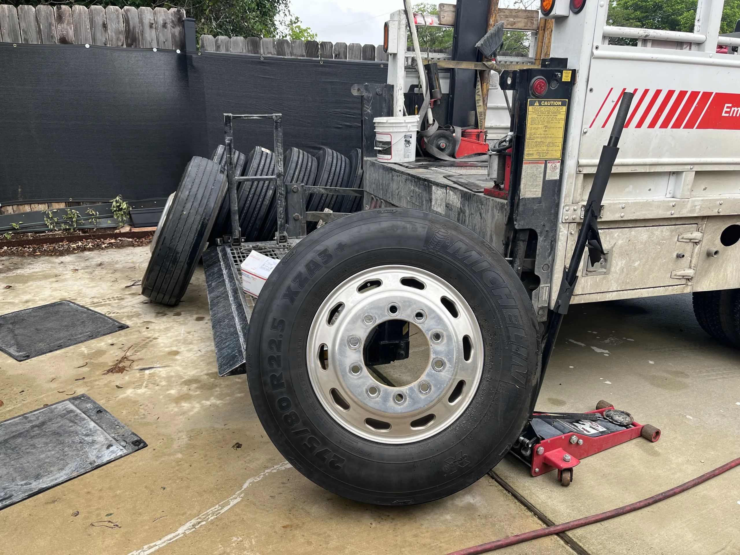 A mobile RV tire replacement vehicle loaded with tires.