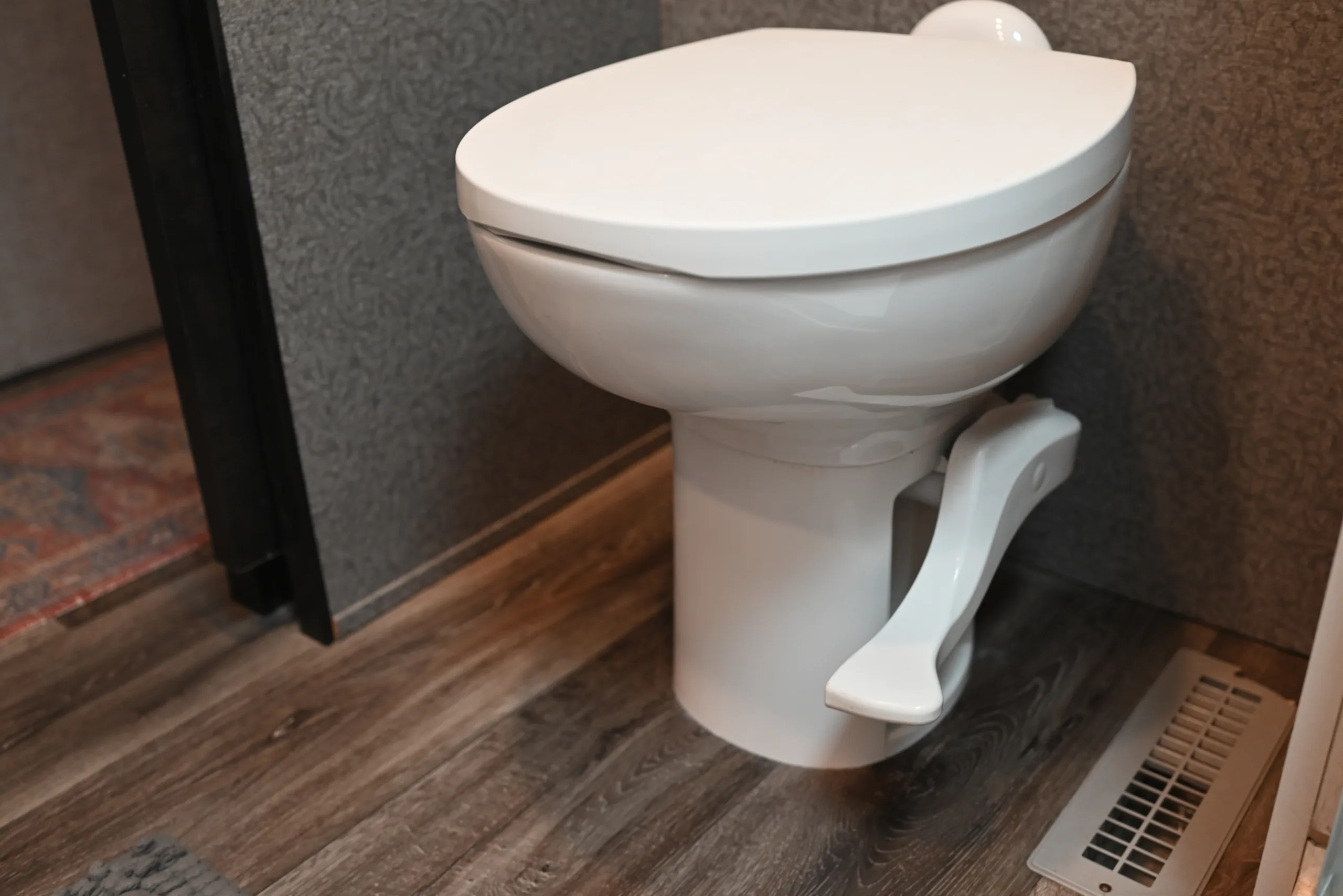RV toilet with RV plumbing