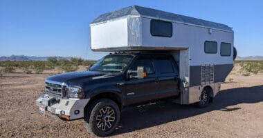 off-road truck camper build in desert scene