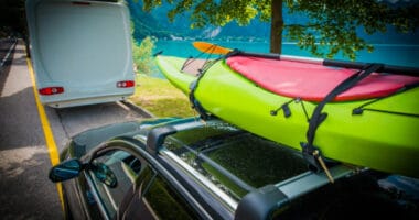 Kayak Transportation on the Car Roof Rack riding behind an RV
