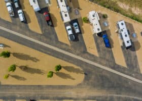 aerial view of rvs in rv sites at extended stay rv park