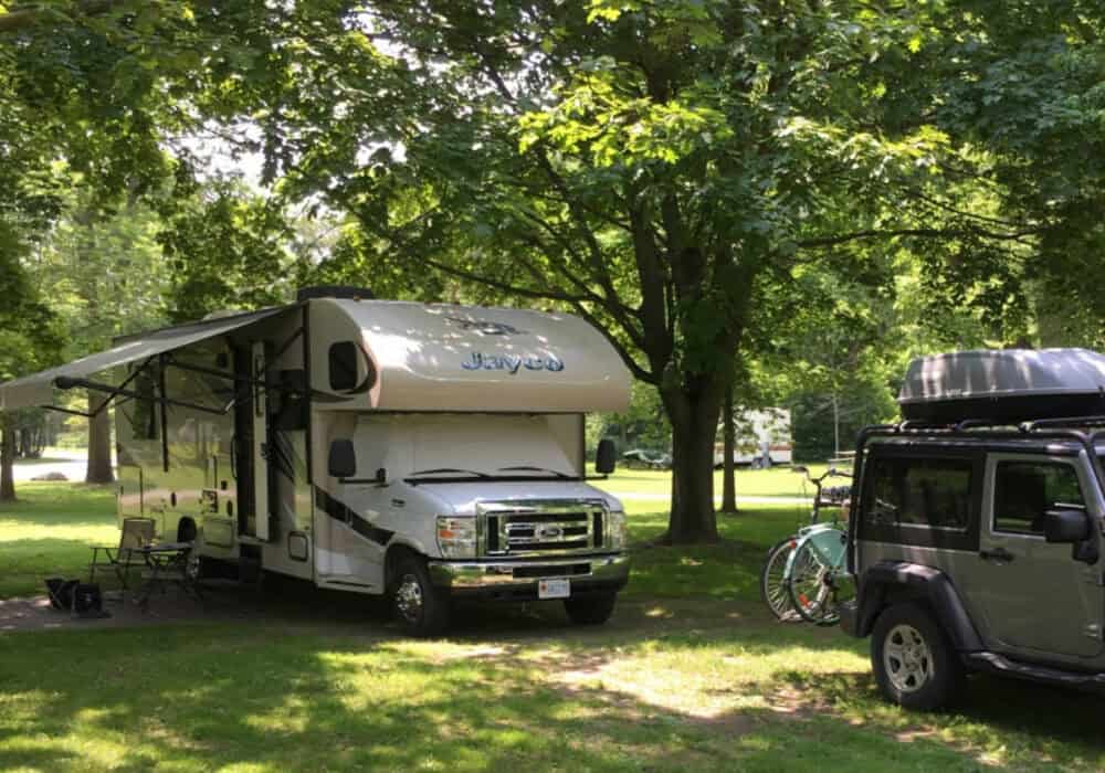RV parked in shade at Glen Rouge Campground